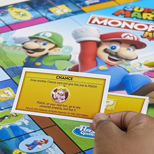 Настолна игра Monopoly Junior Супер Марио Edition, забавна игра за деца на 5 и повече години, Разгледайте Гъби кралство в ролята на Марио, Праскова, Йоши и Луиджи (специално за )